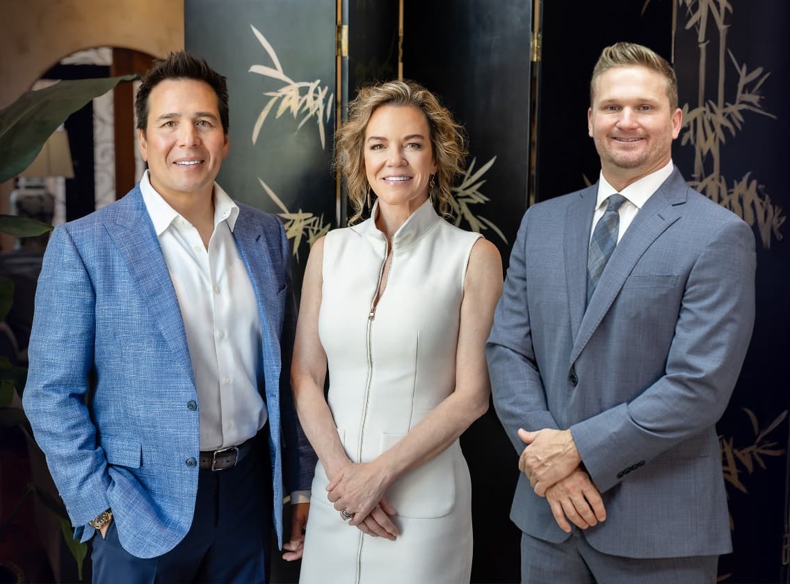 Simeon Wall Jr., MD, FACS, Holly Casey Wall, MD, FACS, and Seth Fruge, MD standing together