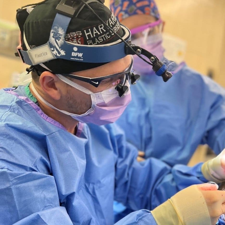 Seth Fruge, MD administering an injectable treatment to a patient in a clinical setting.
