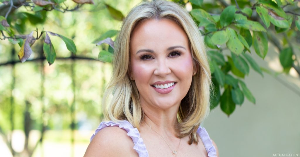 Woman smiling after cosmetic procedure at The Wall Center for Plastic Surgery (Actual Patient)