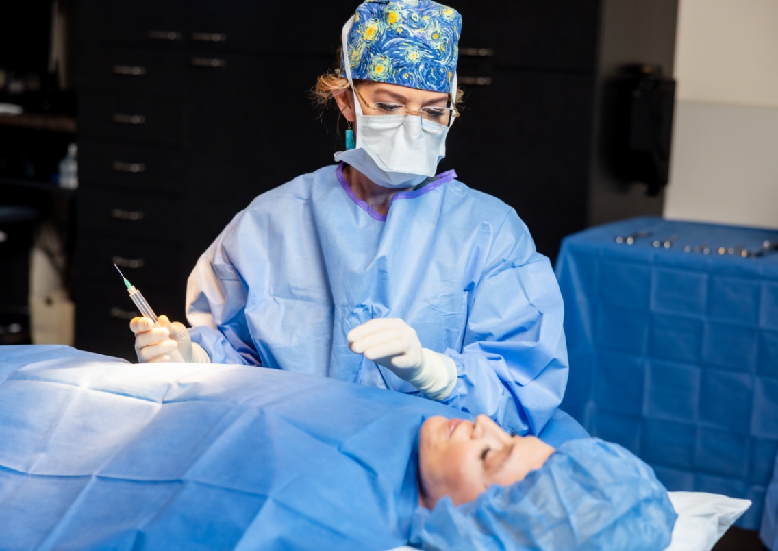 Dr. Holly Casey Wall in operating room