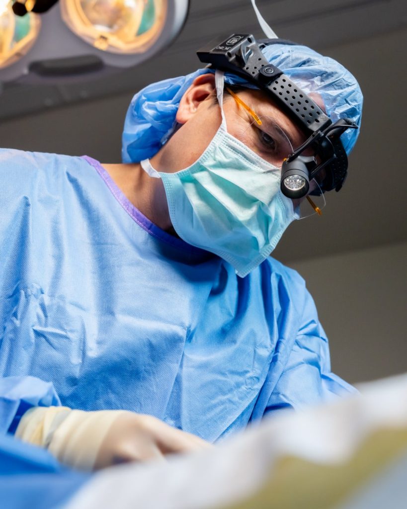 Simeon Wall Jr. MD FACS preforming surgery