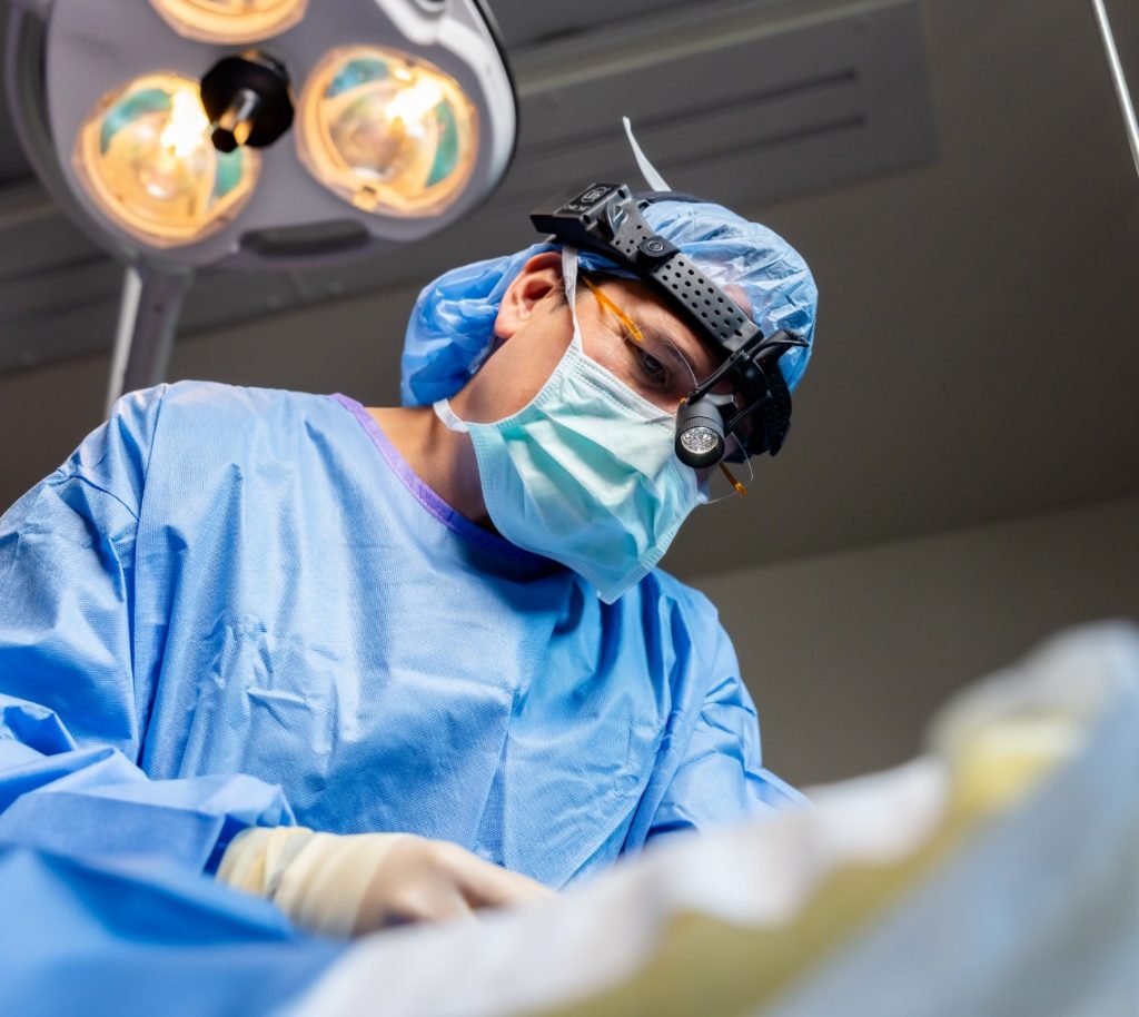 Dr. Wall preforming surgery