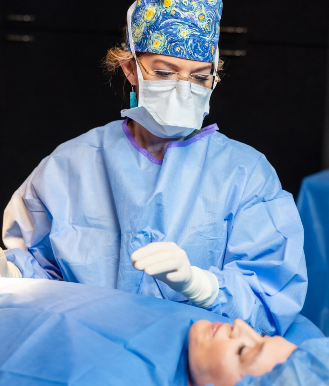 Dr. Holly Casey Wall preforming surgery