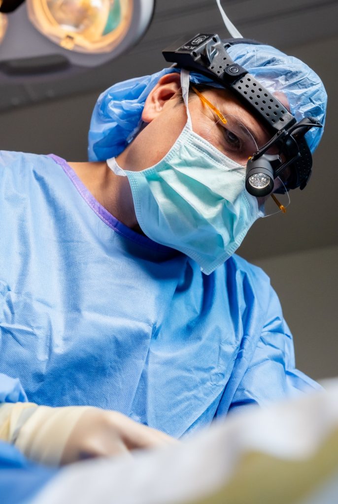 Dr. Simeon Wall Jr. preforming surgery