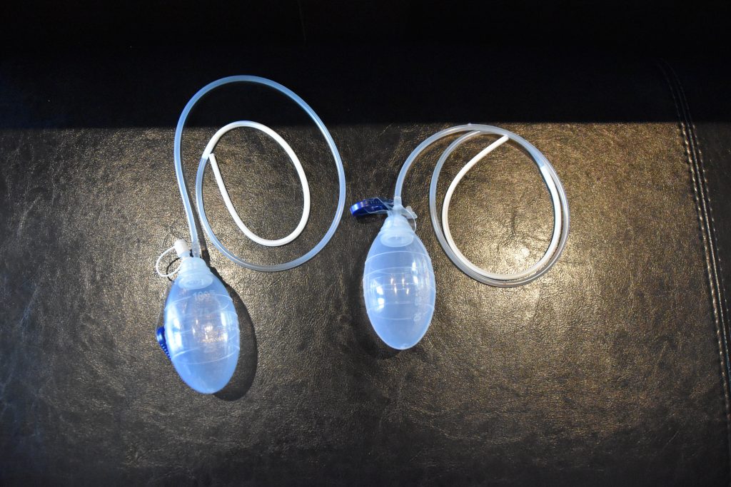 Two bulb drains used in tummy tuck aftercare at The Wall Center for Plastic Surgery