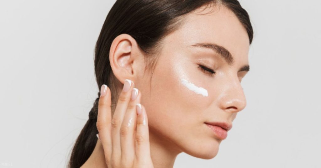 Model image of a woman applying skincare